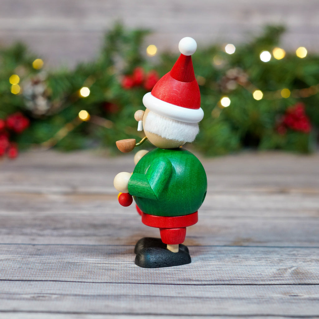 Close-up of Mini Santa Smoker holding a Christmas list