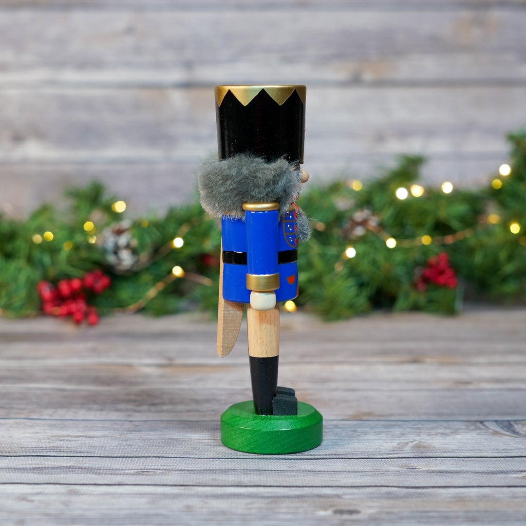 Nutcracker soldier in profile, showcasing side details of uniform