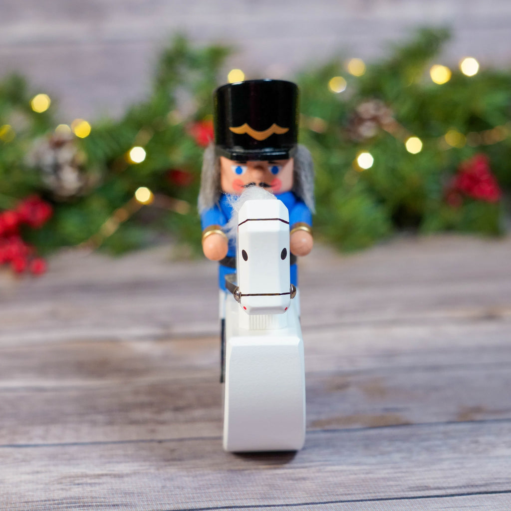 Angle view highlighting the ornate gold trim on nutcracker's coat