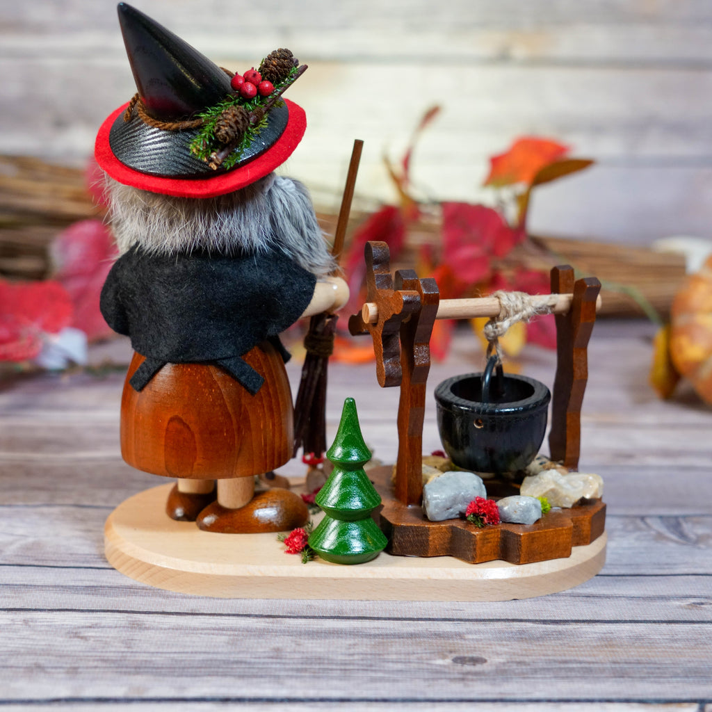 Whole Witch Smoker Set Against Wooden Backdrop