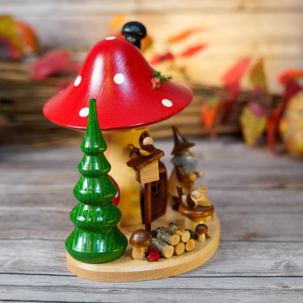 Miniature trees and birds around smoker