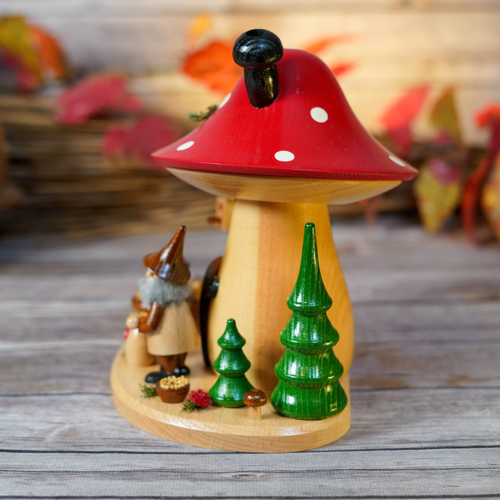 Full setup of German mushroom smoker on wooden table