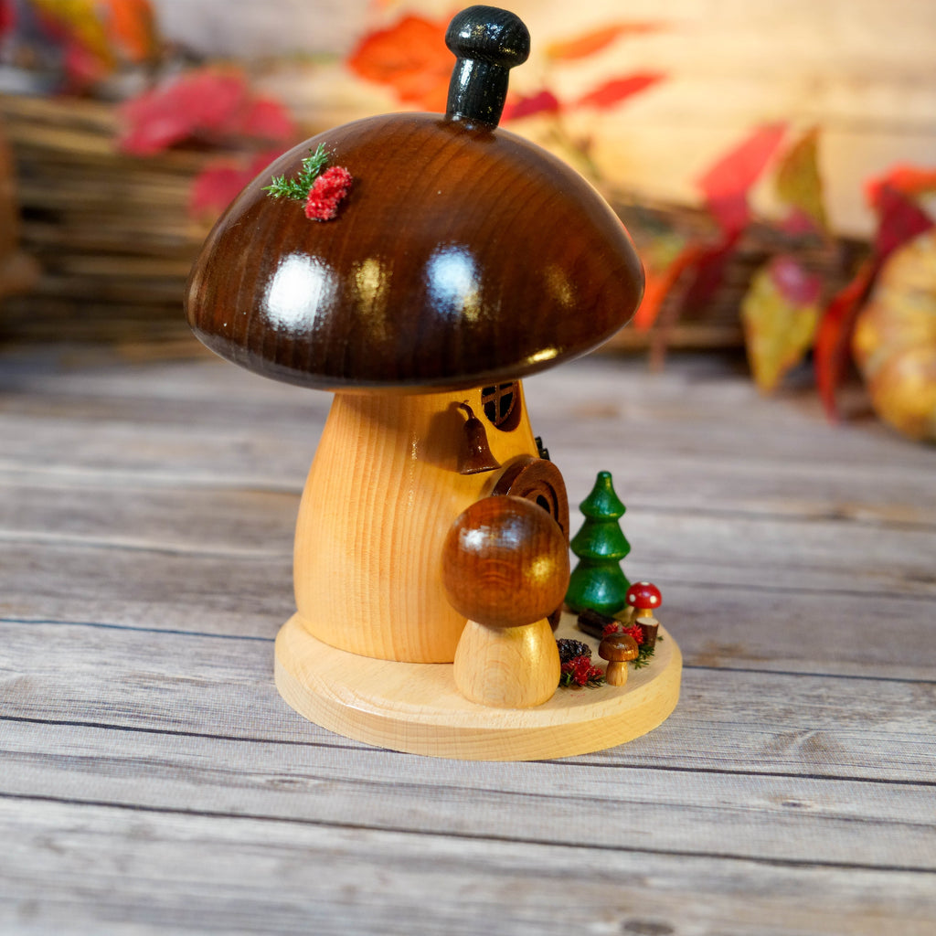 Shiny brown cap of the Mushroom Smoker reflecting soft lighting