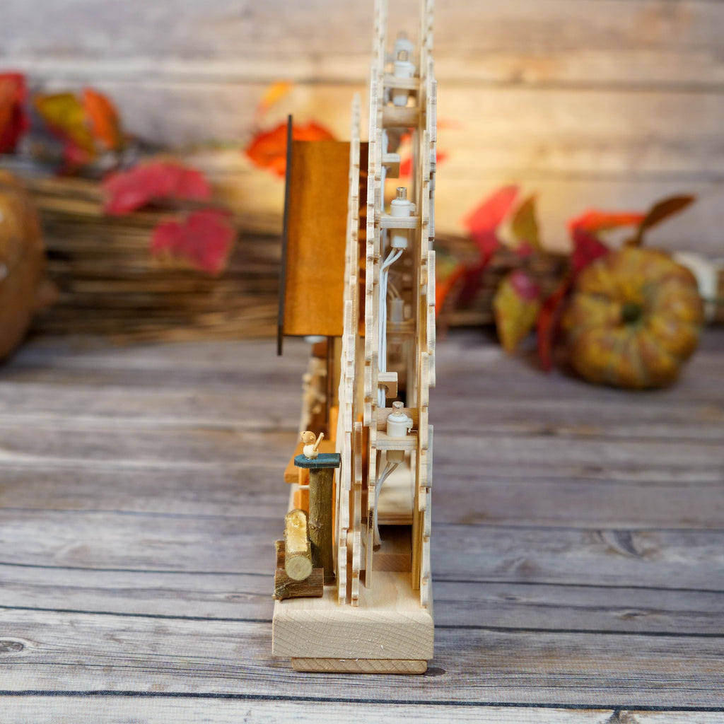 Artisanal craftsmanship of Schwibbogen with natural wood finish