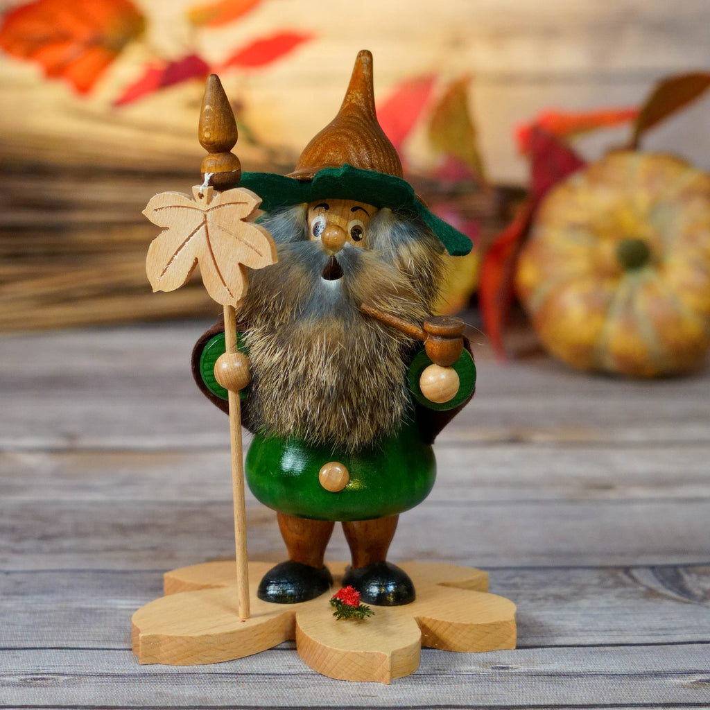 Traditional German smoker with chestnut leaf and red coat
