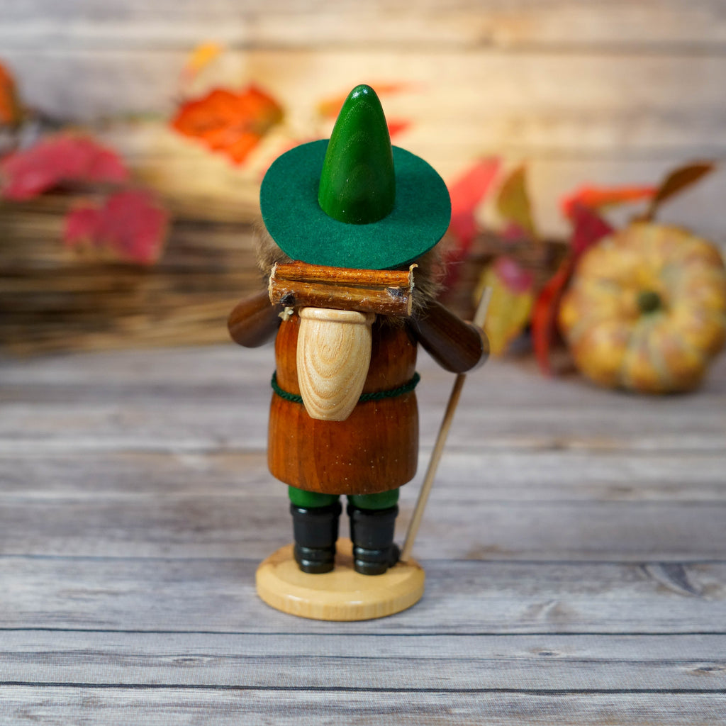 Decorative incense smoker from Erzgebirge with autumn background