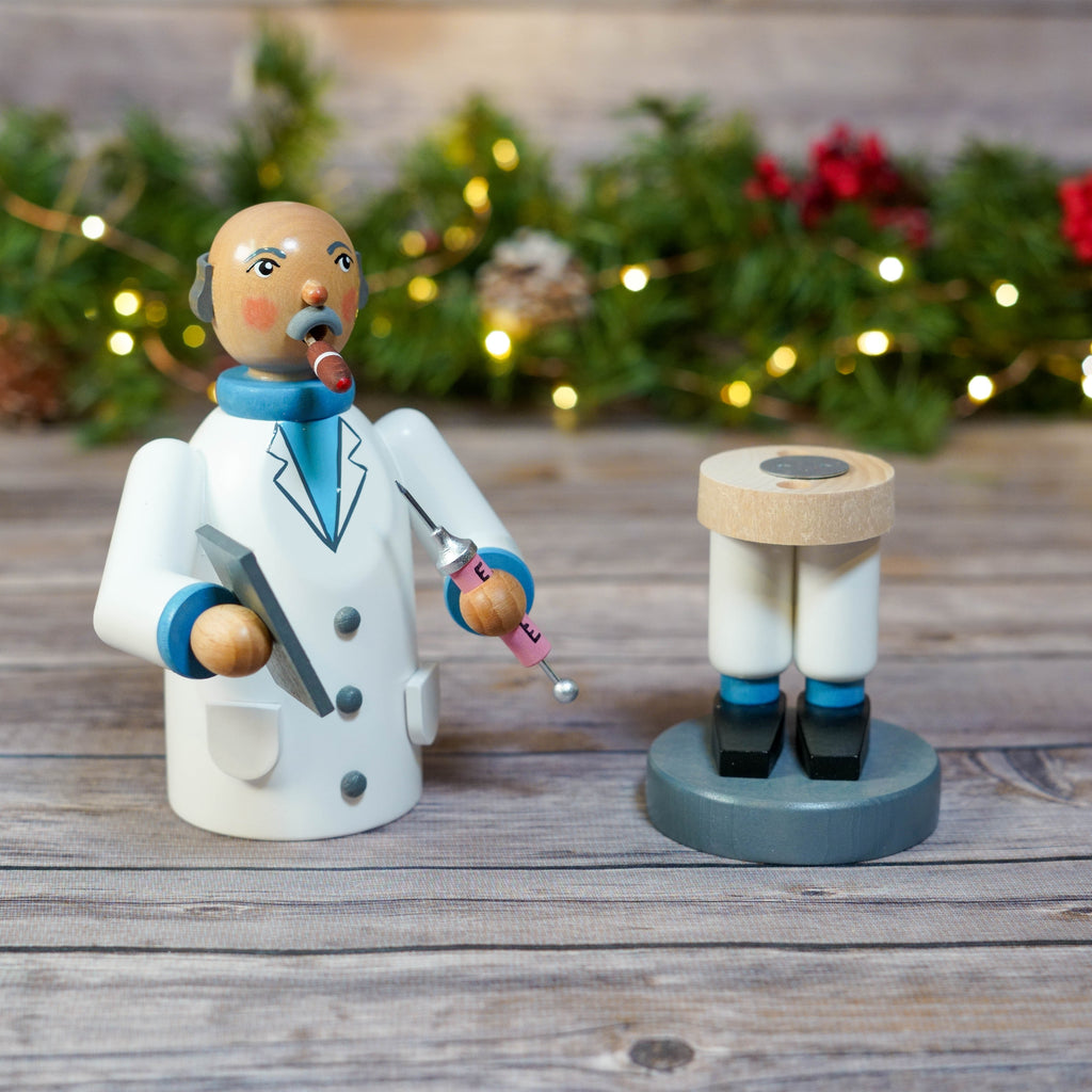 Traditional wooden doctor smoker with holiday lights