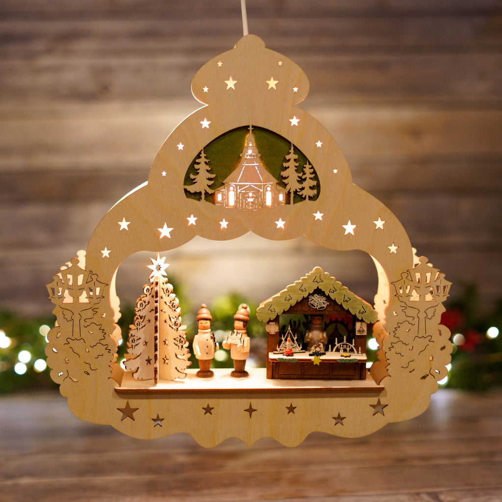 Window star showing figures at market stalls