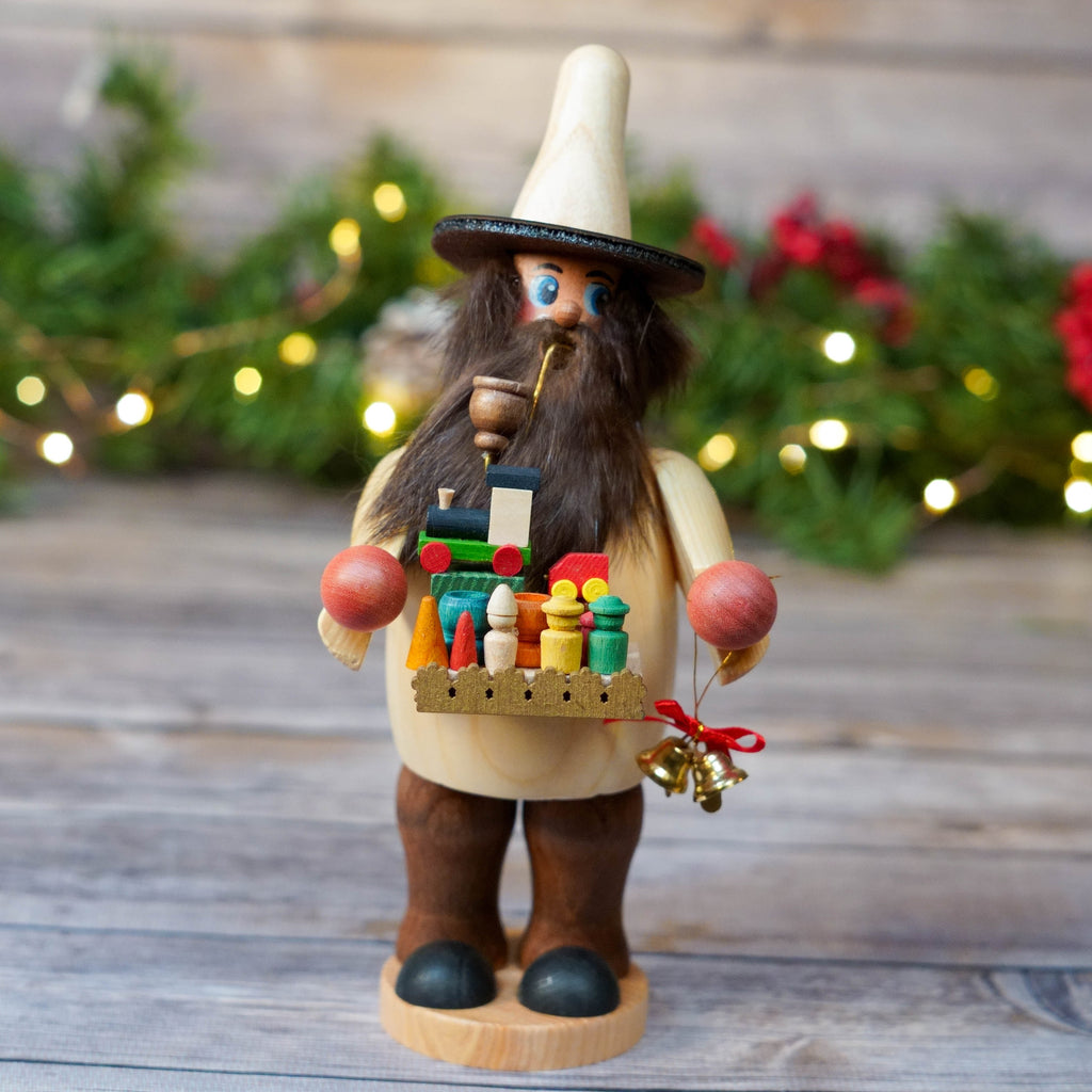 Erzgebirge hunter smoker with fluffy beard and wooden rifle