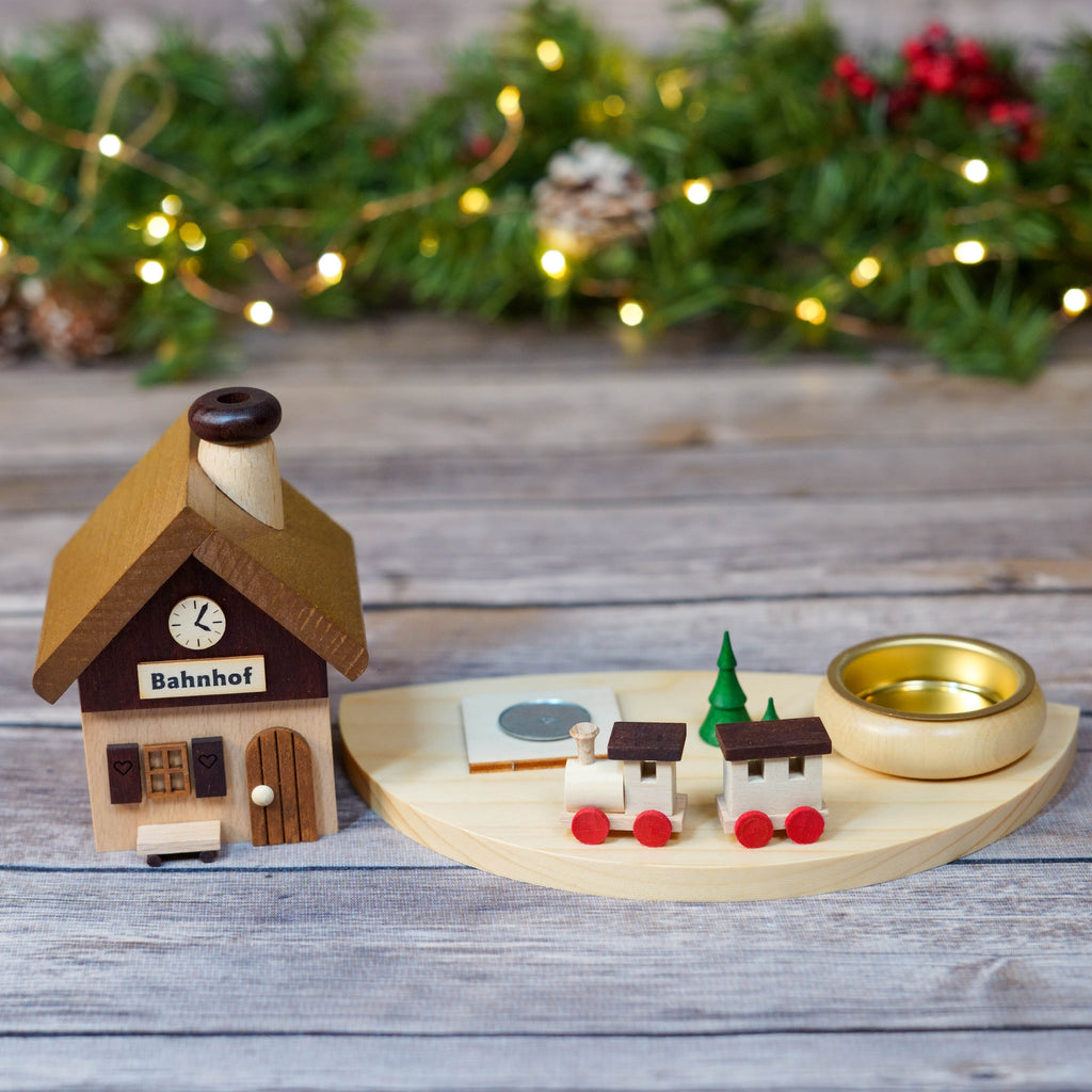 Smoker house train station with incense cone and holiday lights