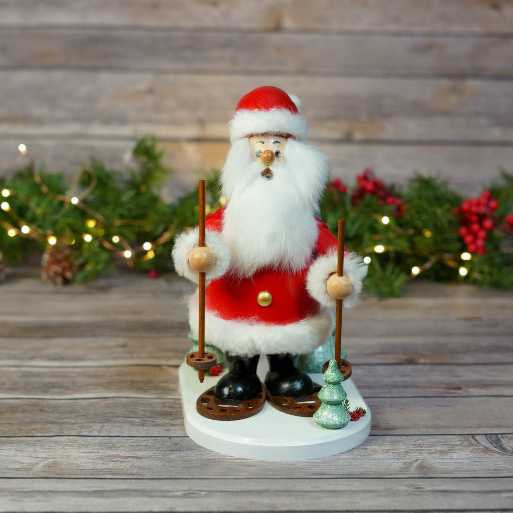 Traditional Snowshoeing Santa Smoker with festive backdrop