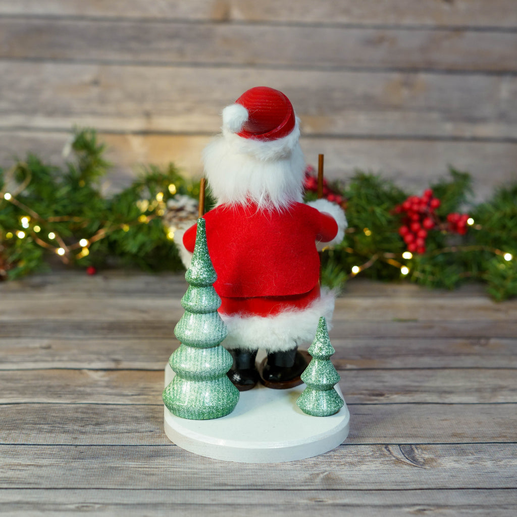 Santa Smoker in a holiday setting with lights and greenery