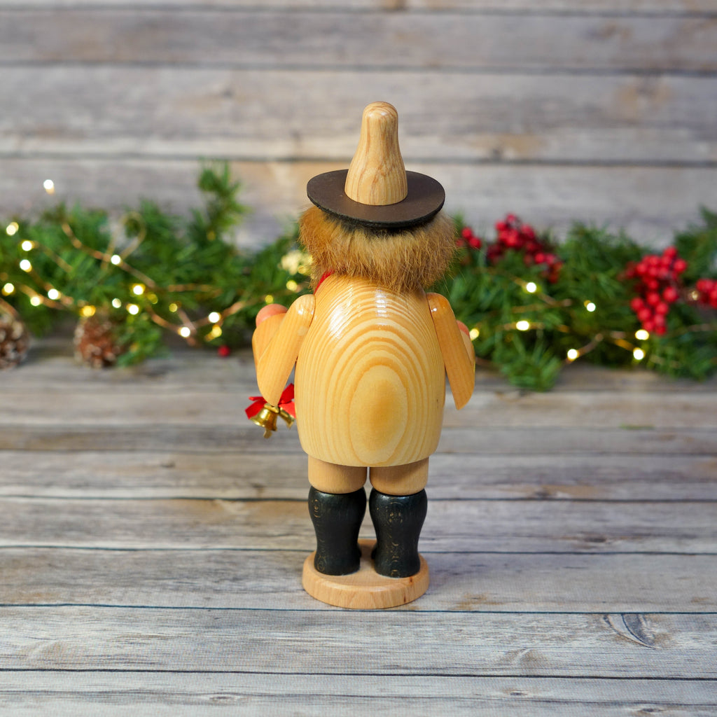 Lateral view of Toy Salesman Smoker displaying side details