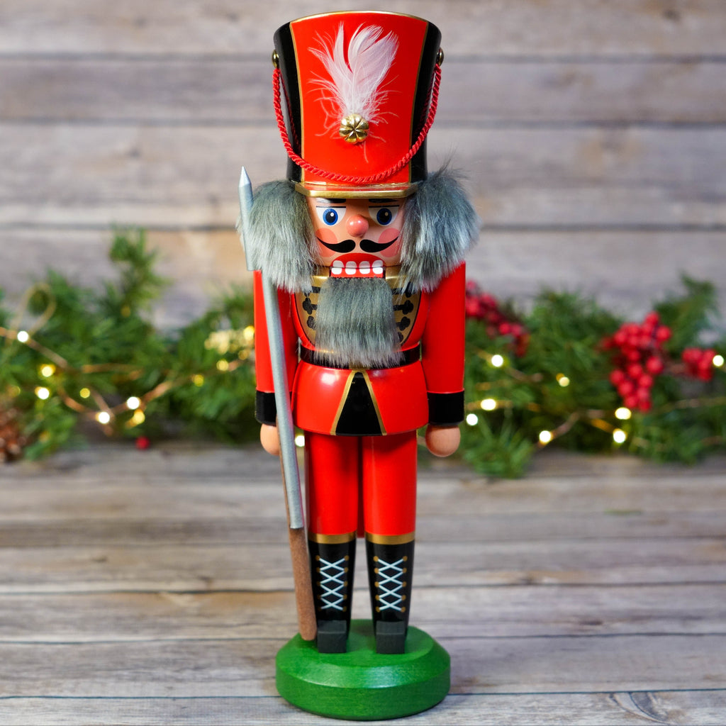 Red Soldier Nutcracker with holiday background