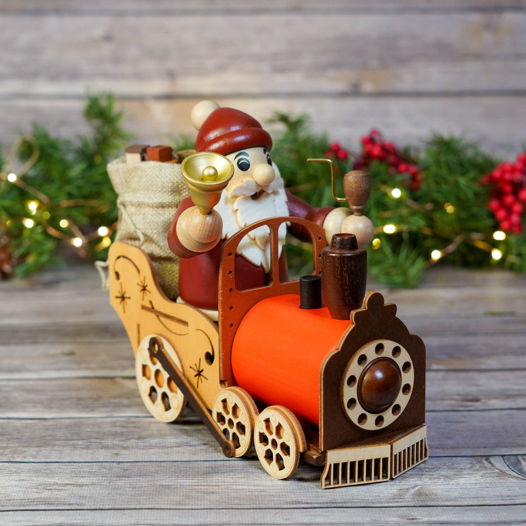 Handcrafted Wooden Santa in Train Smoker with festive background