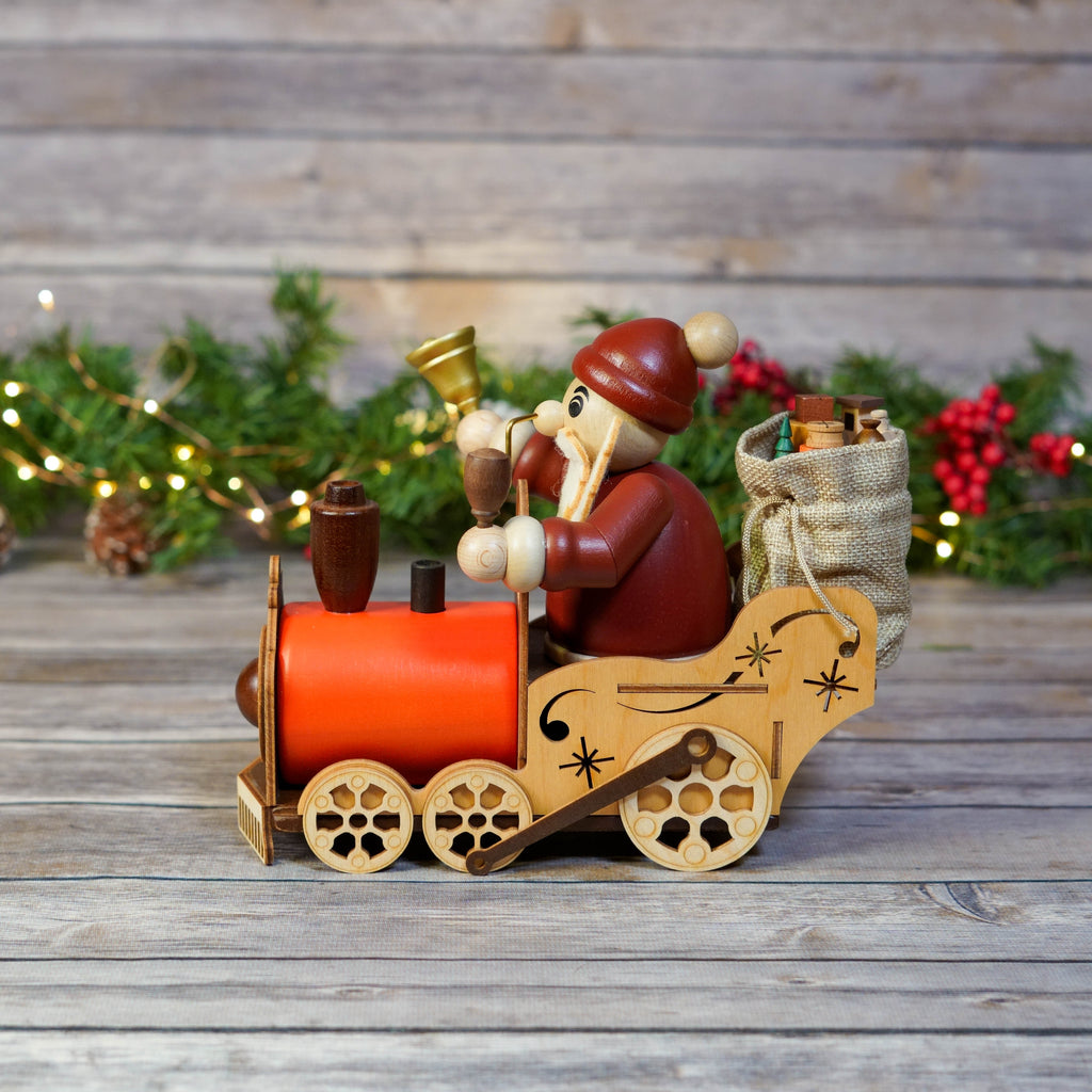 Detailed view of Santa in train smoker showing hand-painted features
