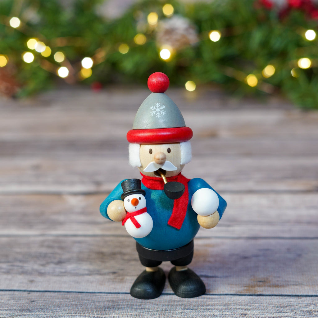 Traditional mini smoker with snowman in festive attire
