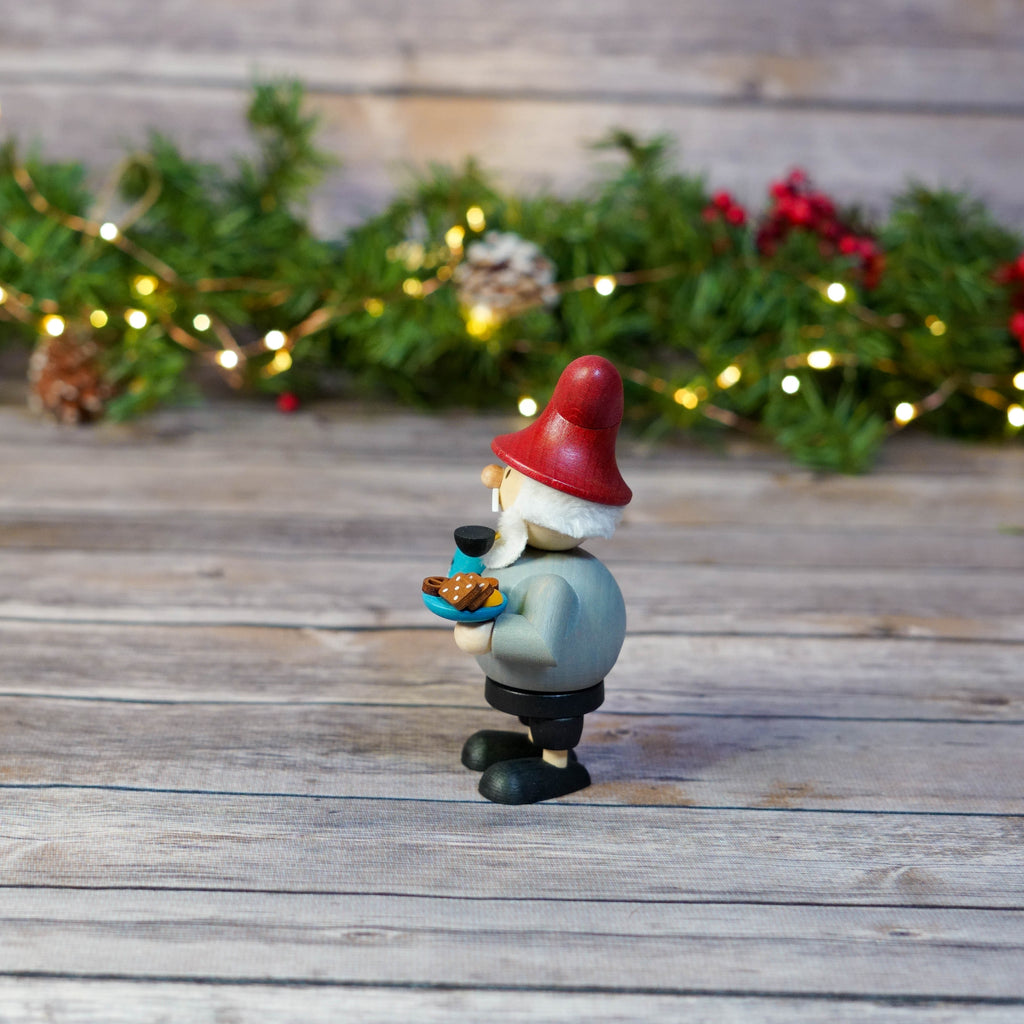 Detailed close-up of gnome's face and red hat