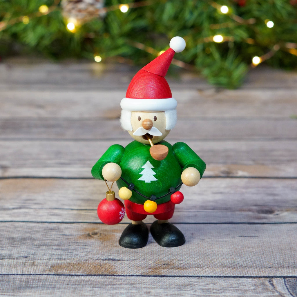 Mini wooden Christmas smoker with green shirt and red Christmas ornament