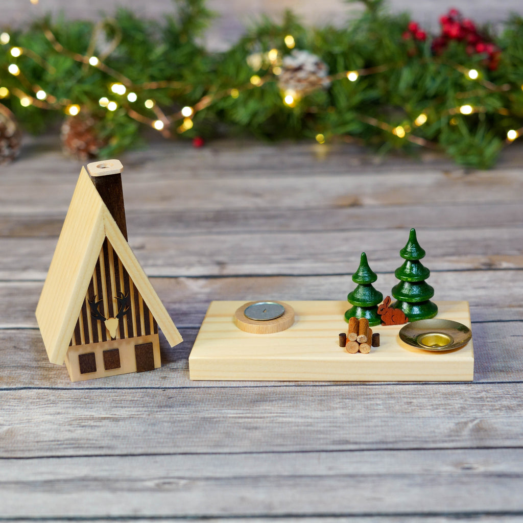 Traditional German smoker house with incense cones and Christmas trees