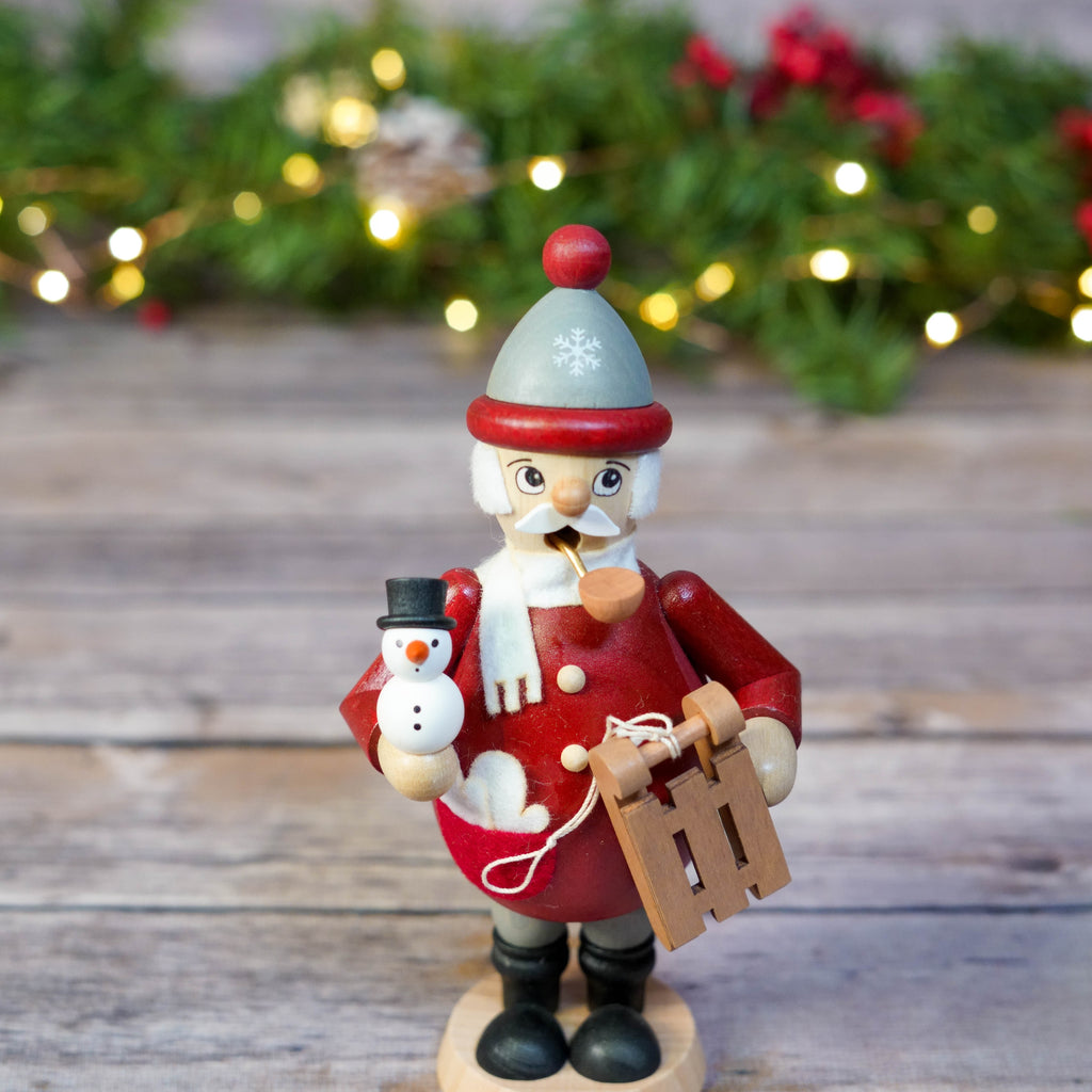 Rear view of fanciful German Smoker with sleigh and snowman