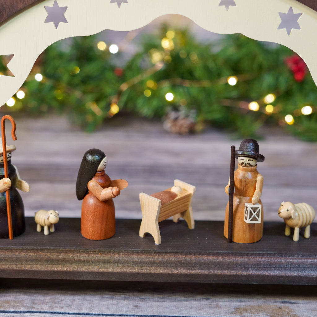 Rustic Wooden Nativity Arch with Festive Background