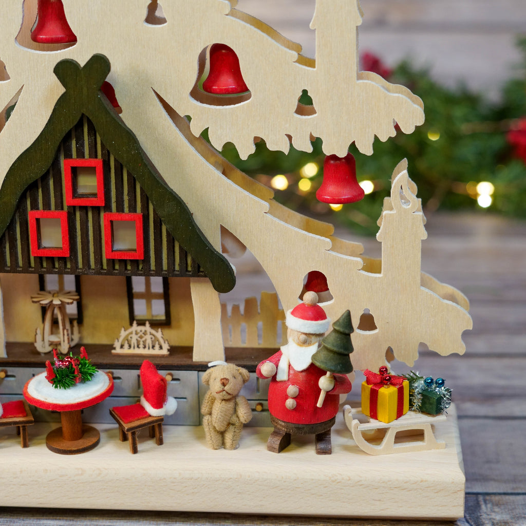 Detailed miniature festive figures under the Erzgebirge Fir Tree