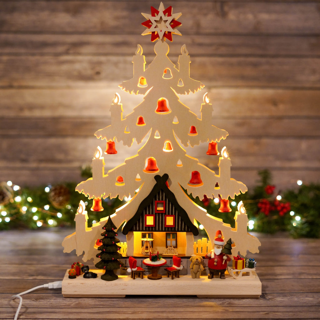 Close-up of lighted candles on the wooden Christmas Schwibbogen