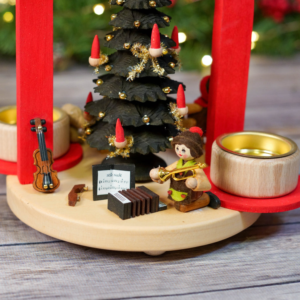 Full front view of German Christmas Pyramid with festive background