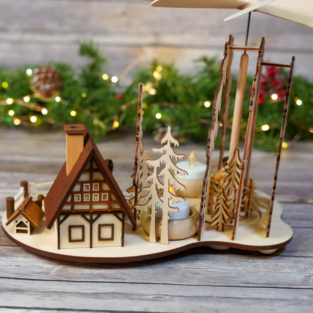 Tealight holder integrated in wooden Christmas Pyramid