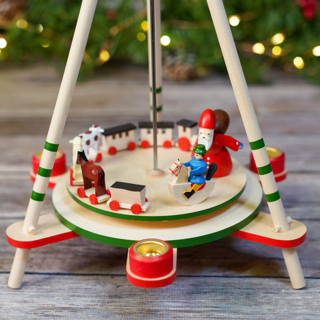 Close-up of wooden toys and figures on festive Christmas Pyramid