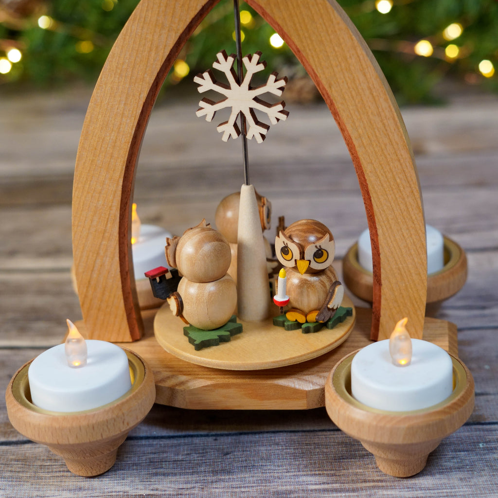 Elegant wooden Christmas Pyramid with rotating blades