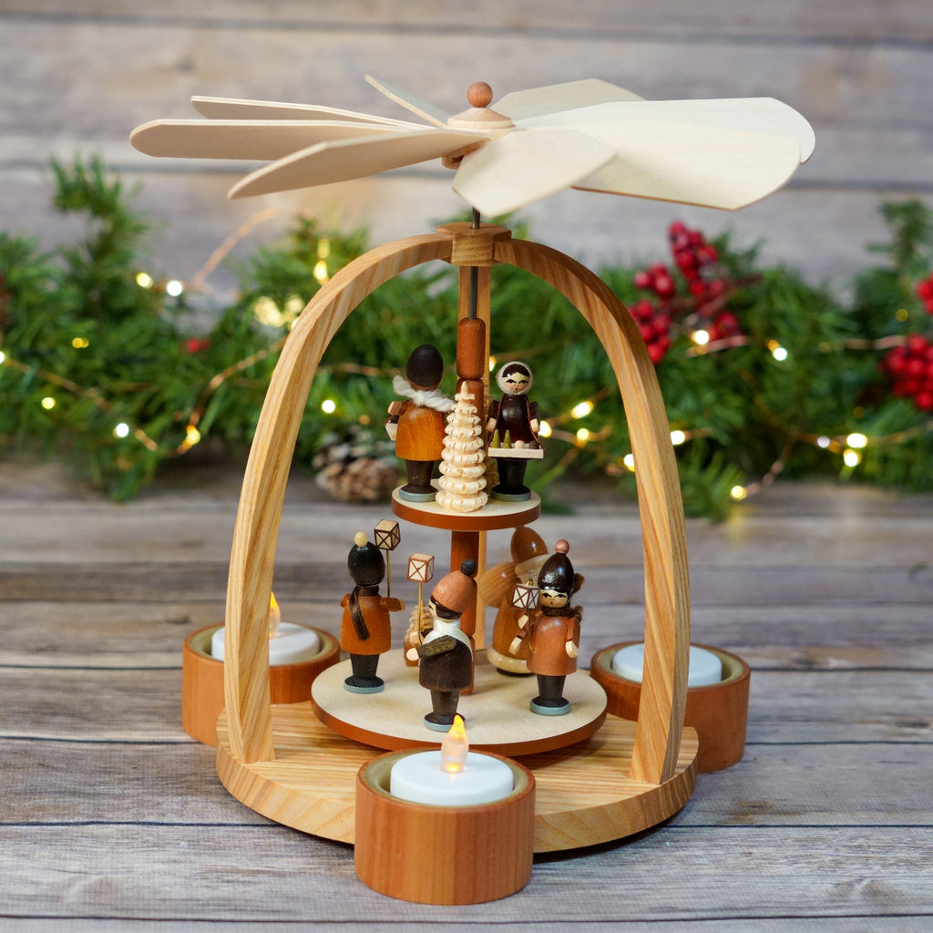 Traditional German Christmas Pyramid with figures and lit candles