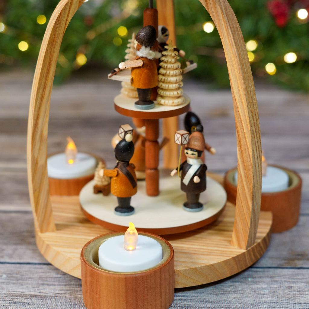 Christmas Pyramid at twilight with festive background lighting