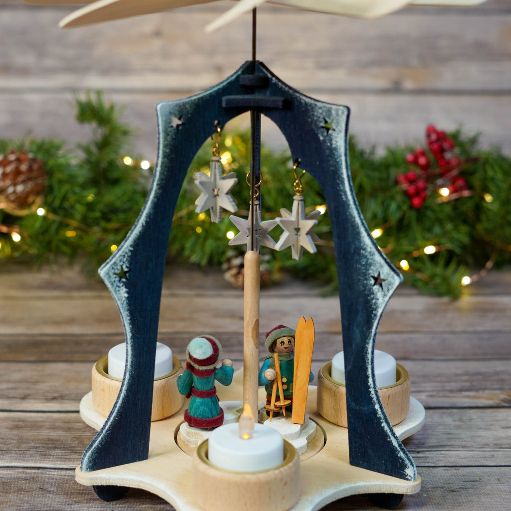 Top view of blue Christmas pyramid showcasing the propeller and stars
