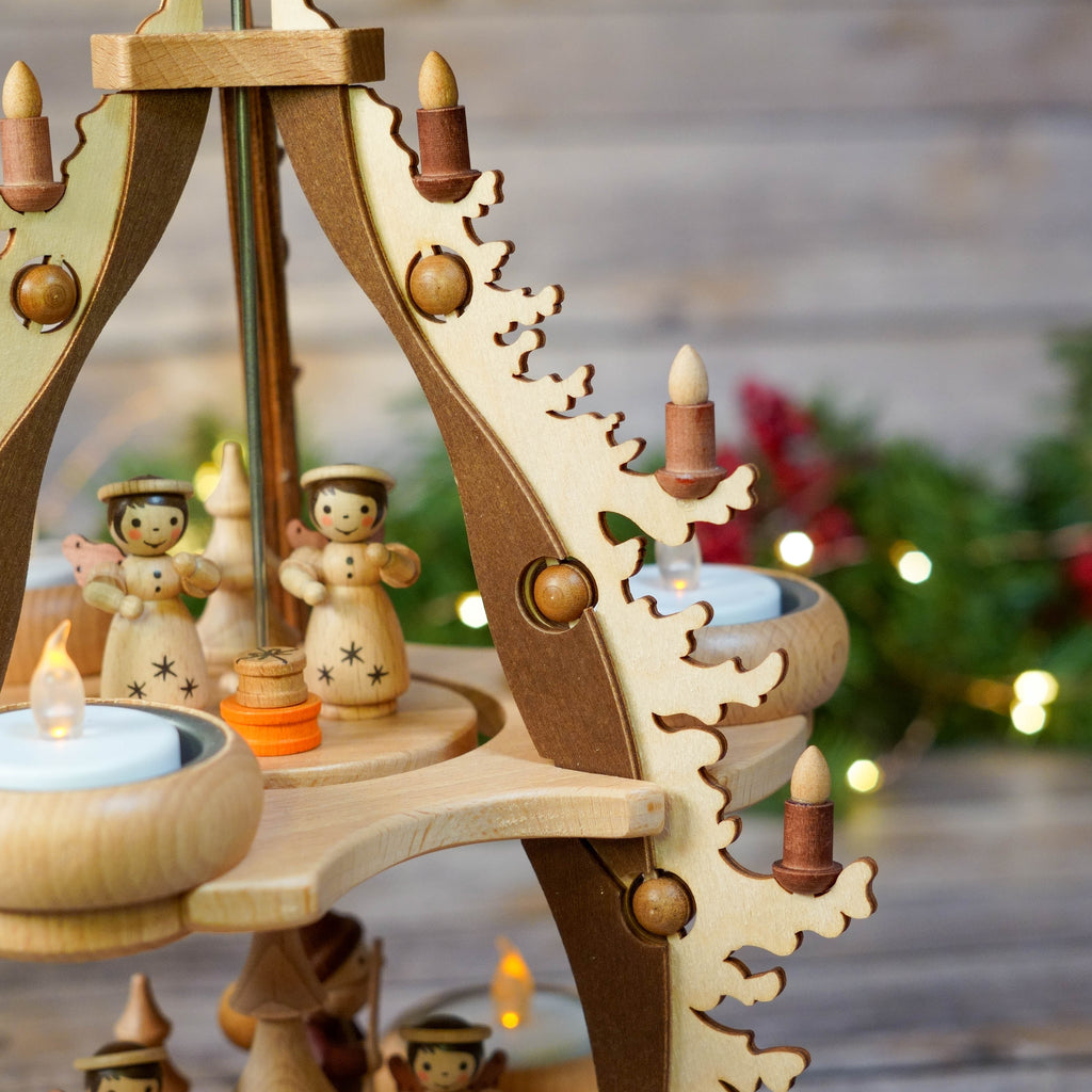 Christmas pyramid set against festive backdrop