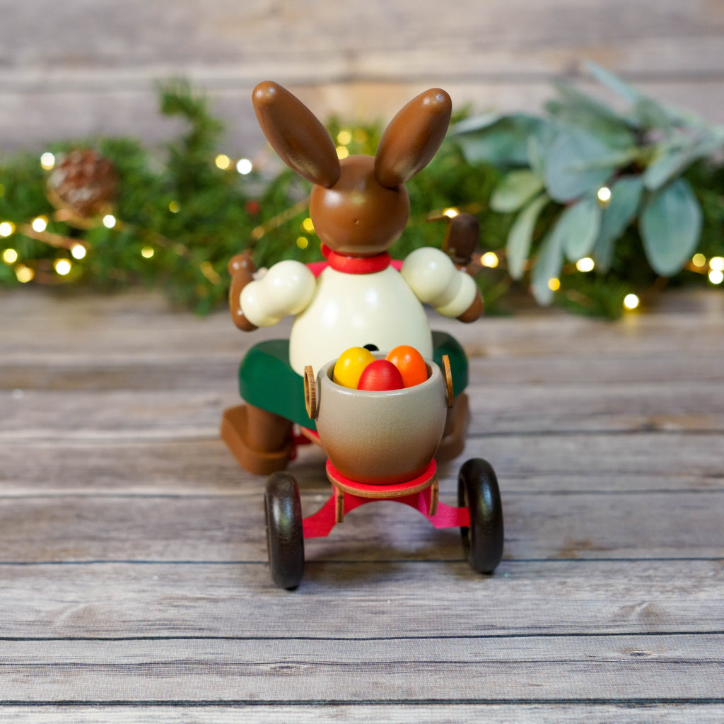 Bunny on Trike Smoker in a holiday setting with Christmas lights