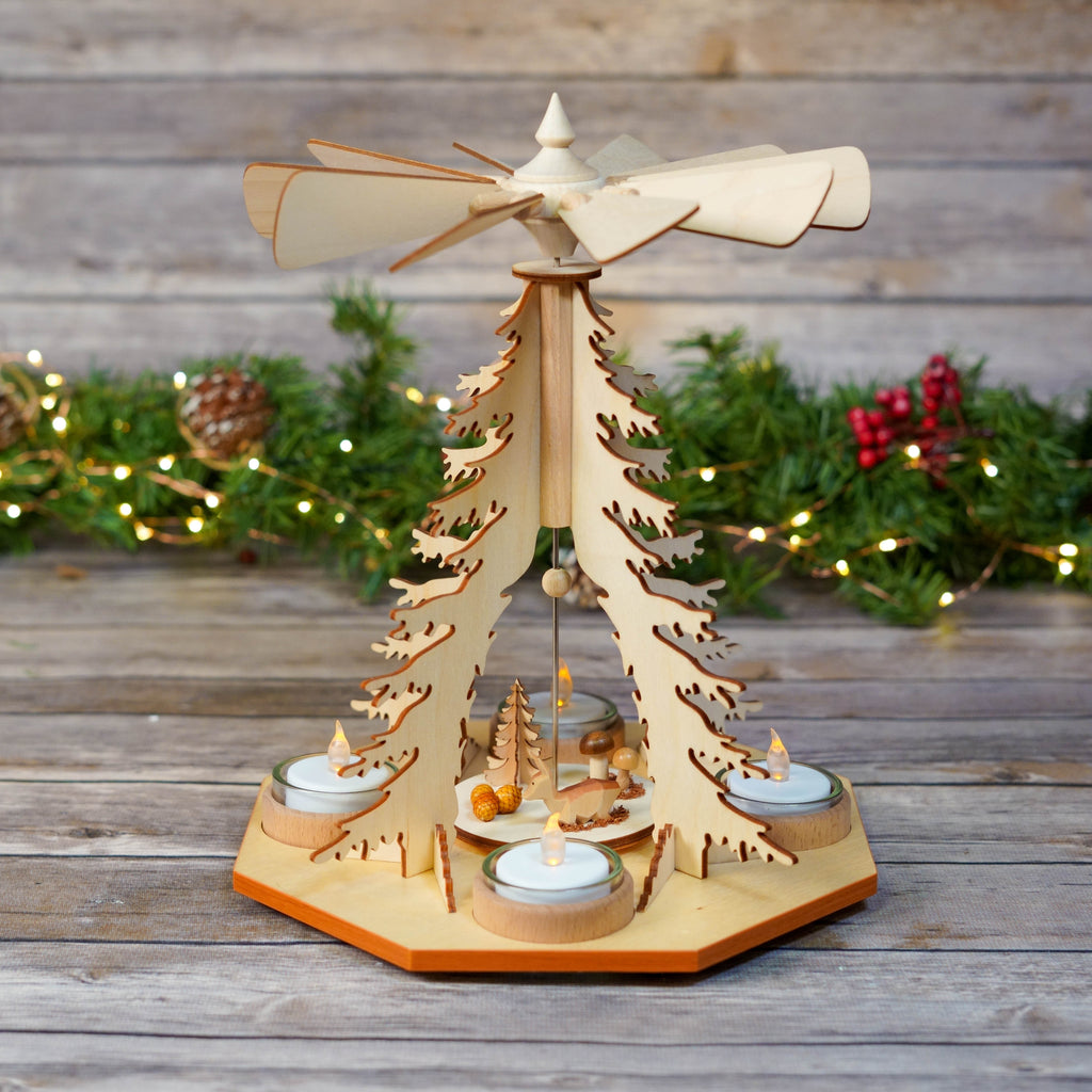 Traditional German Christmas Pyramid with illuminated candles