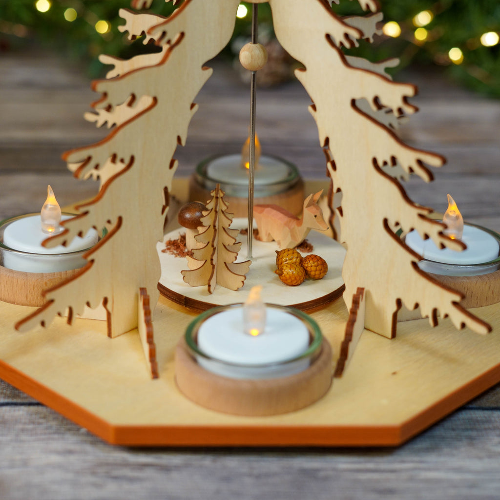Christmas Pyramid in a festive setting with background lights