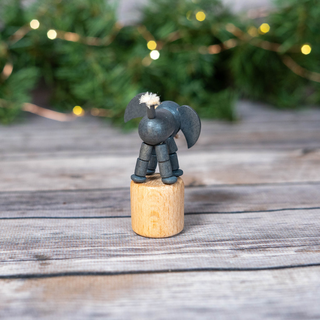 Wobbly Elephant Toy on wooden surface